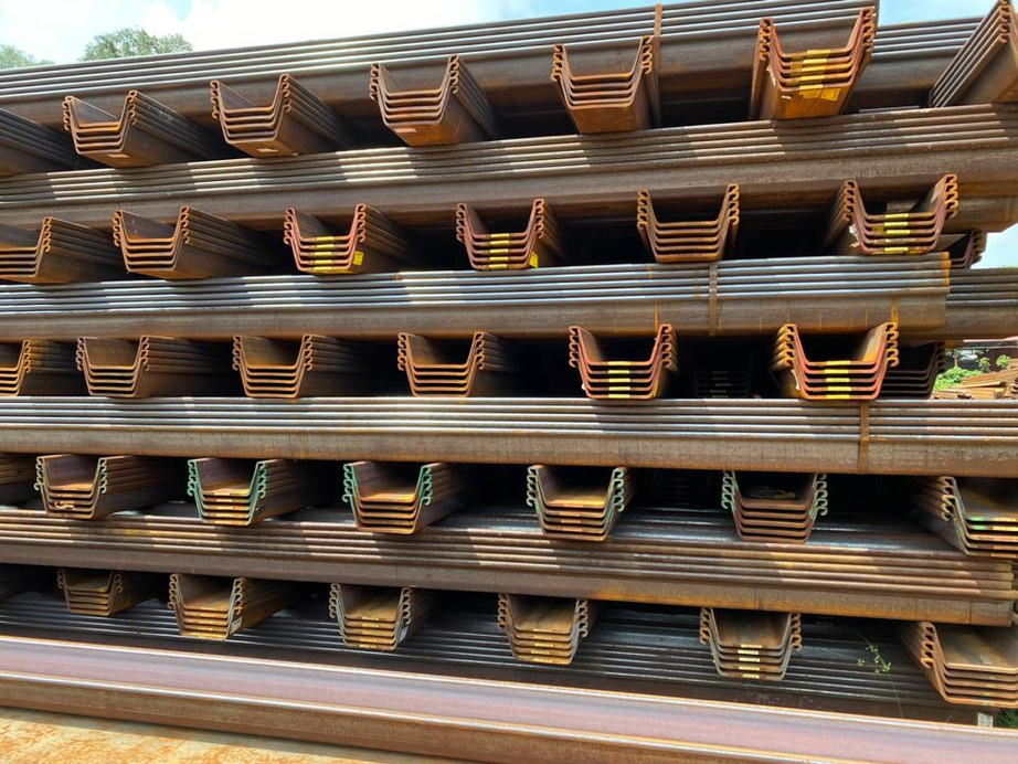 Racks of hot-rolled steel sheet piles stacked in the Hai Fu yard